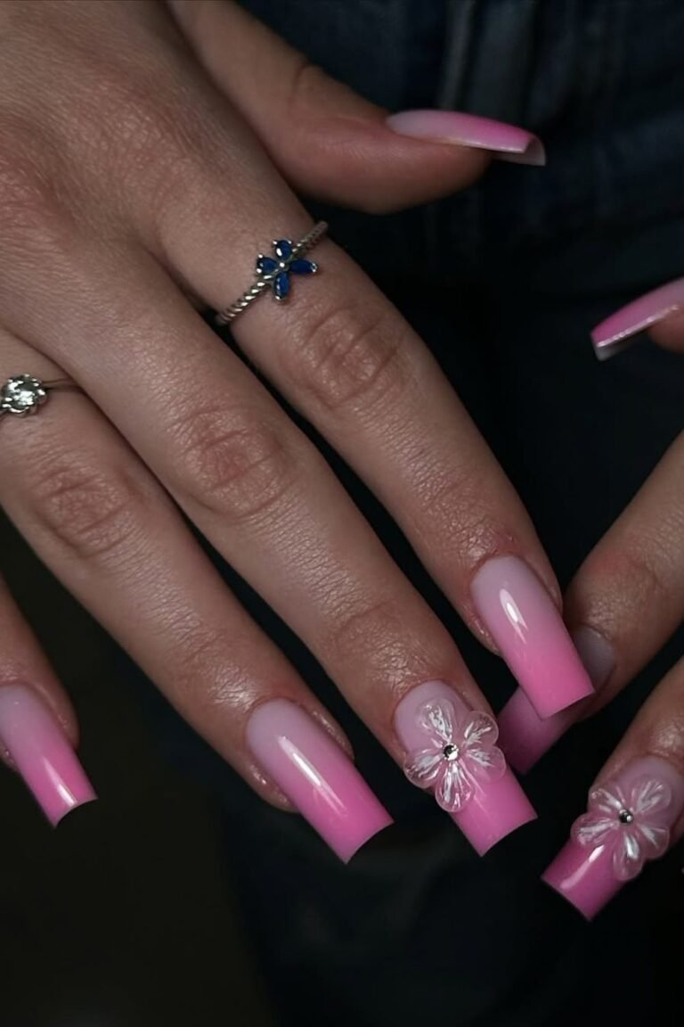 Prom nail ideas featuring Baby pink fading into sheer perfection one 3D flower nail