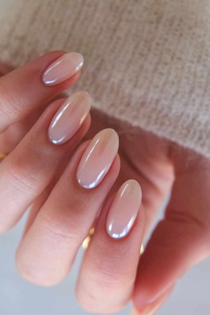 Neutral-toned glazed nails with high shine and minimal design, ideal for simple, classy wedding nails.