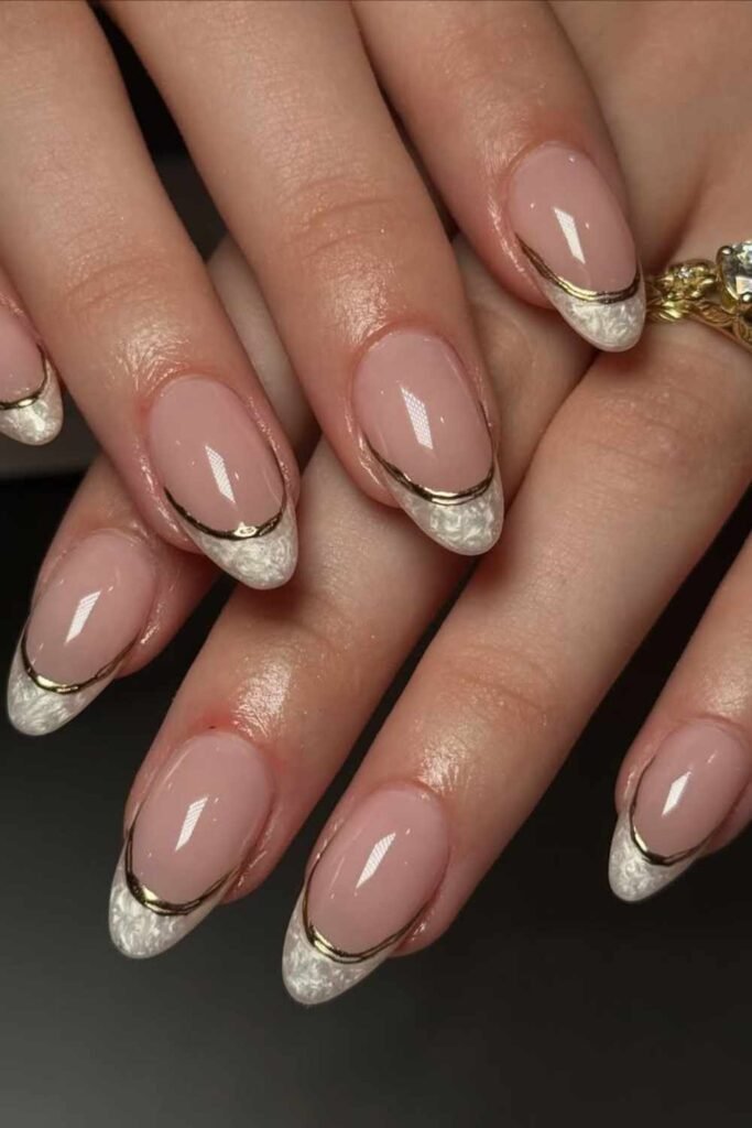 Creamy nude Finger with soft white French tips in a vintage style, ideal for simple classy wedding desgn.
