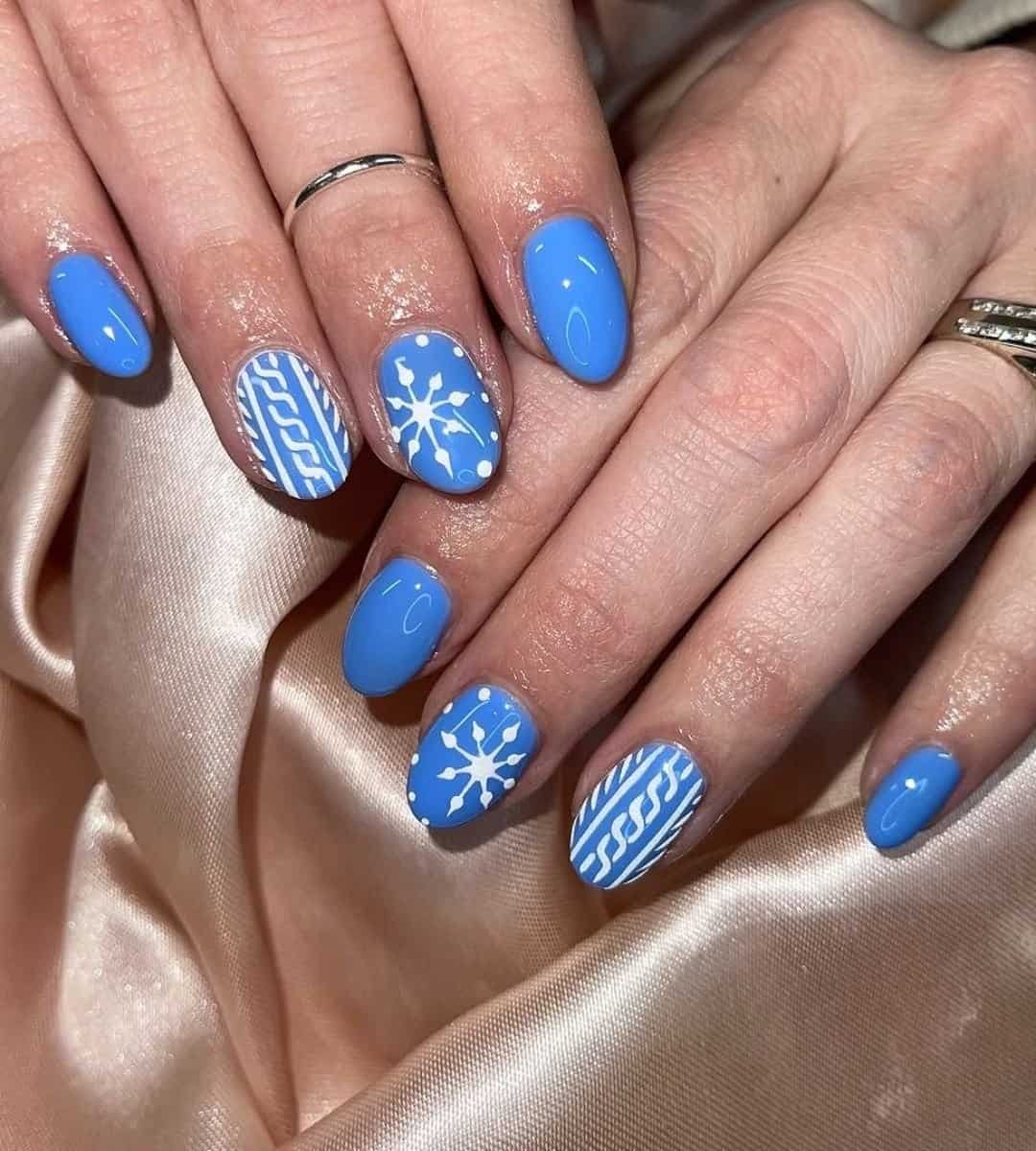 Blue Sweater Nails With Snowflakes
