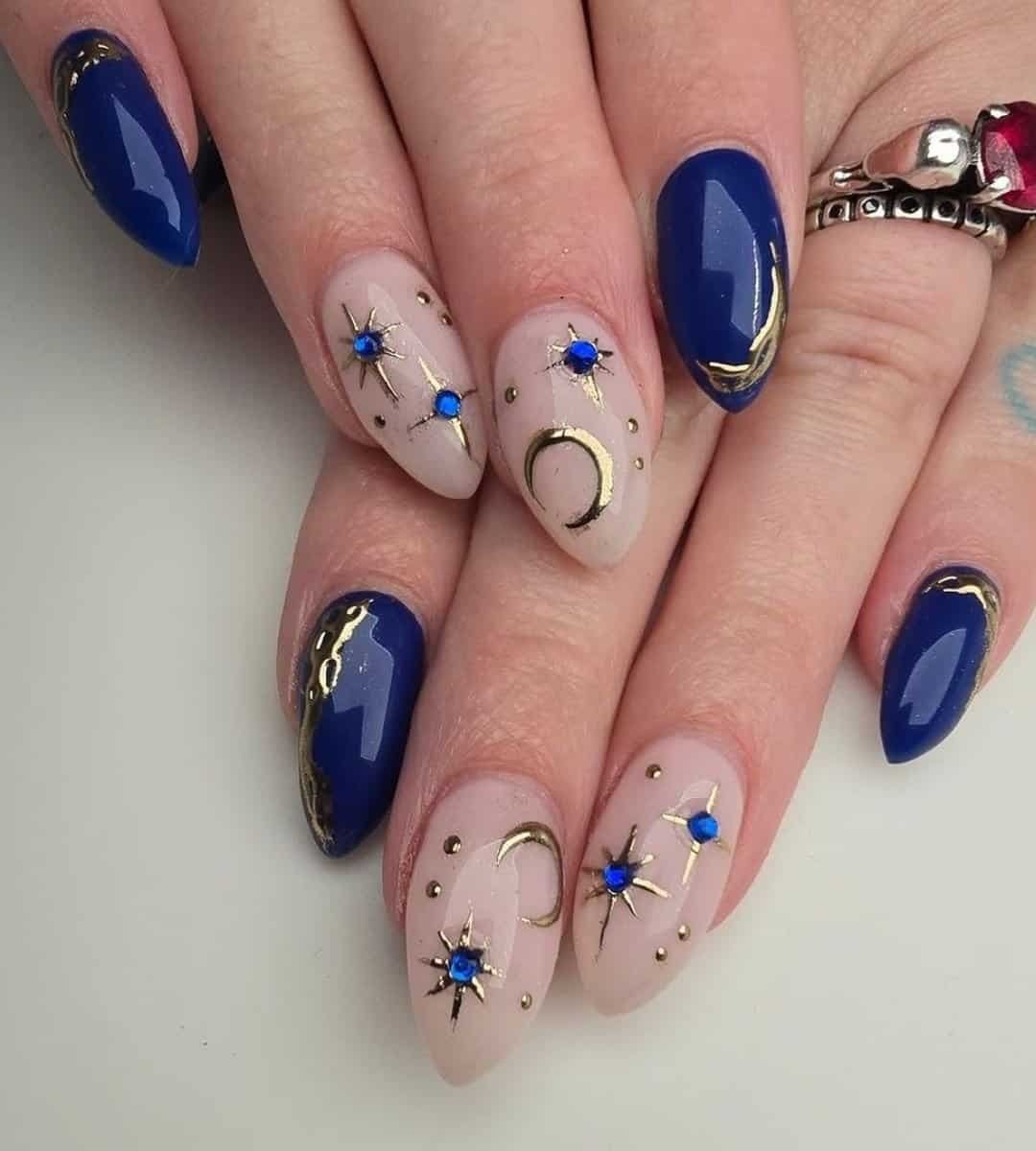 Bold Glossy Blue Nails with Golden Accents