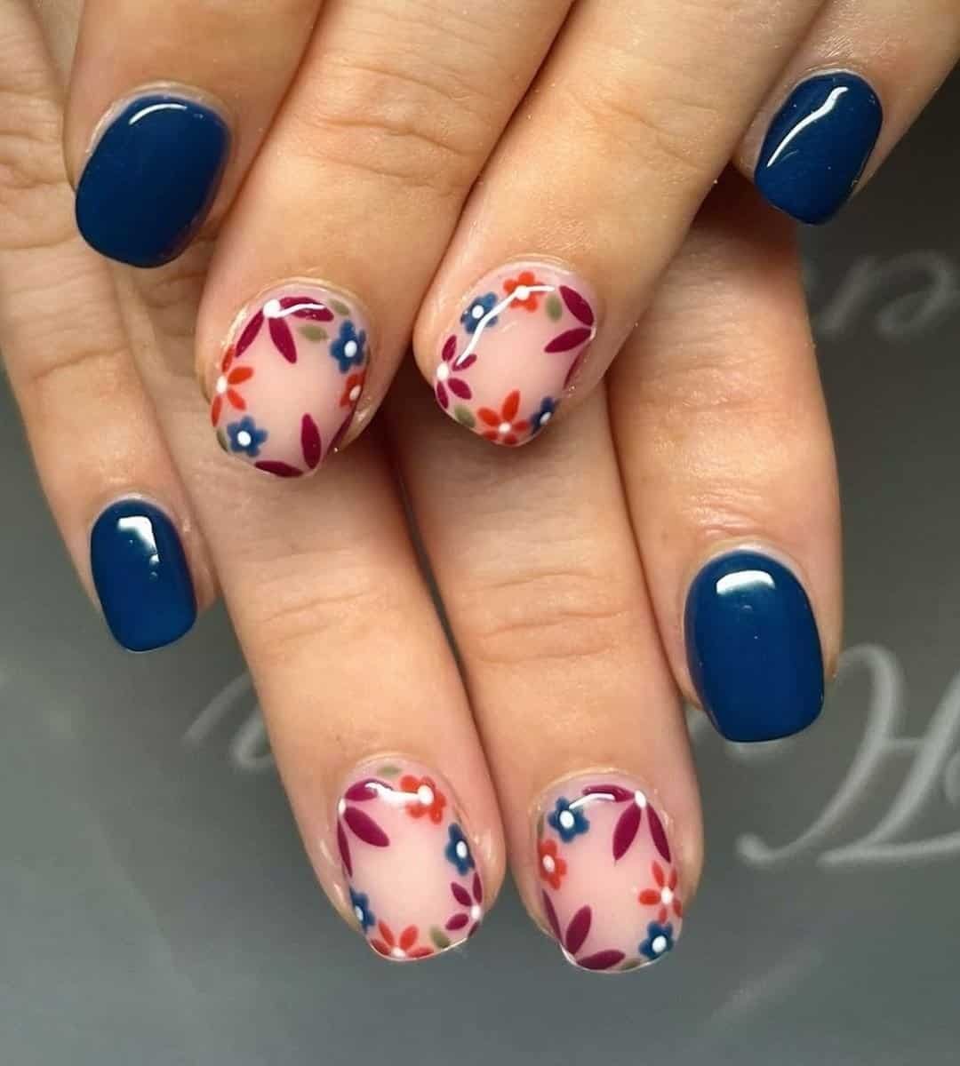 Deep Blue Nails with Autumn Florals on a nude base