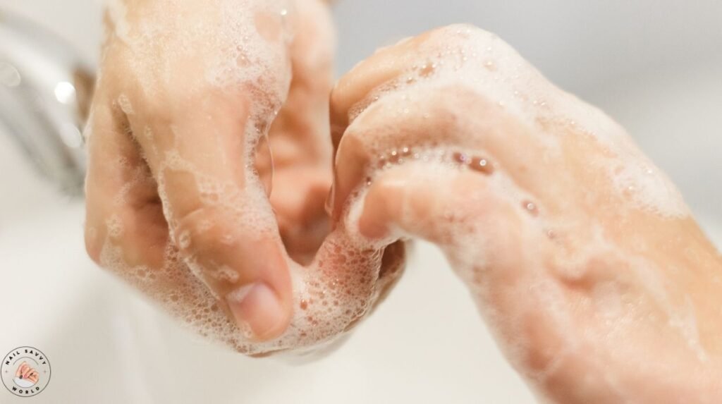 Everyday habits to protect your nails at home with gloves, cuticle oil, and moisturizer. Nail care routine essentials — protective gloves and cuticle oil to prevent nail breakage. How to protect your natural nails during household chores with gloves and hand cream. Simple at-home nail care tips: hydration, gloves, and oil to keep nails strong. Protecting your nails from breaking while doing chores with gloves and cuticle oil.