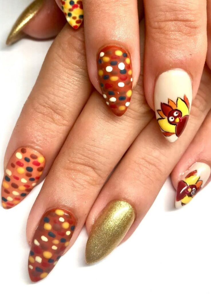 For the bold ones, metallic glitter on one nail, printed turkey accents on the other, are a total crowd-pleaser.