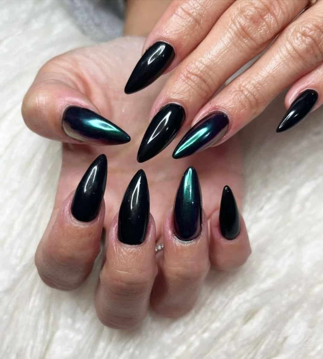 This look plays with iridescence, like gasoline on water. Black chrome with a rainbow sheen is futuristic and stunning in any light.