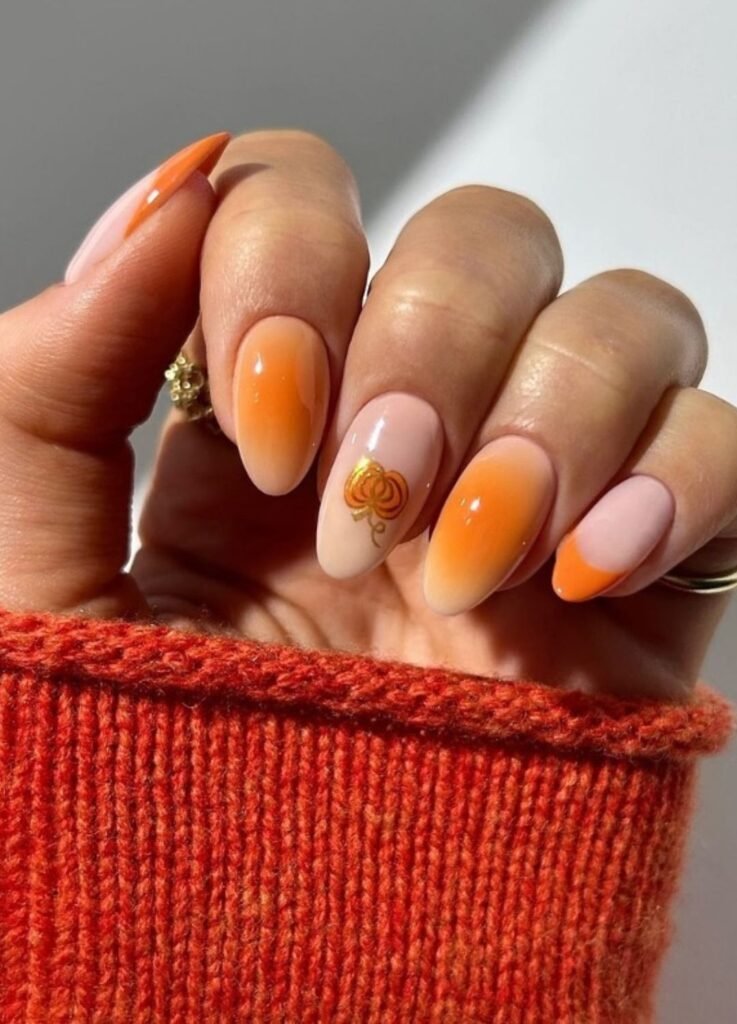 Inspired by harvest season, this mani uses beige in warm tones, burnt orange, and gold. Think of the sparkle of autumn pumpkin under sunlight, but on your fingertips.
