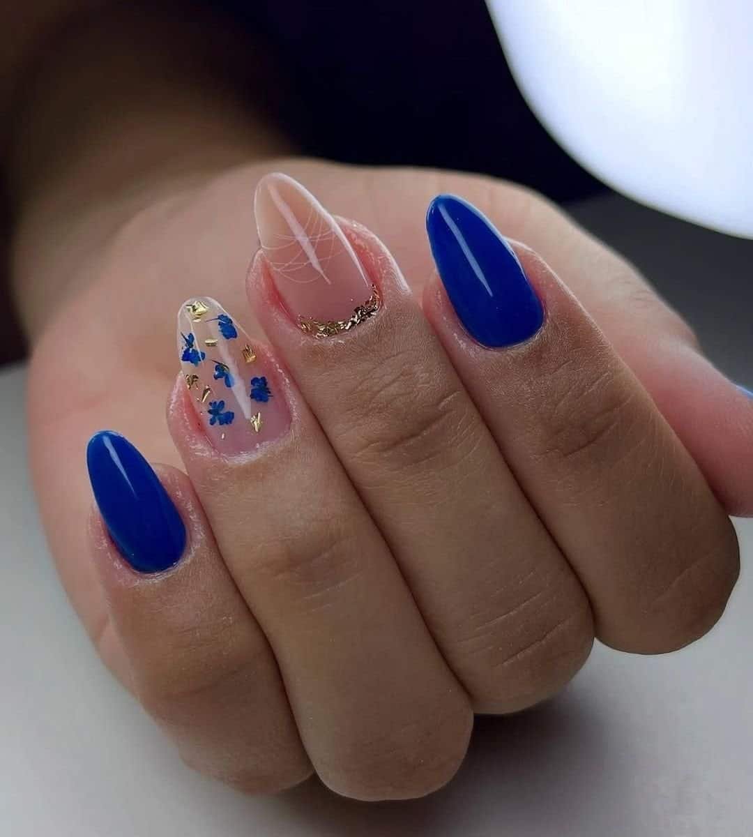 Royal Blue Nails with Floral & Flakes 